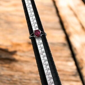 Elegant Silver Ring with Red Gemstone